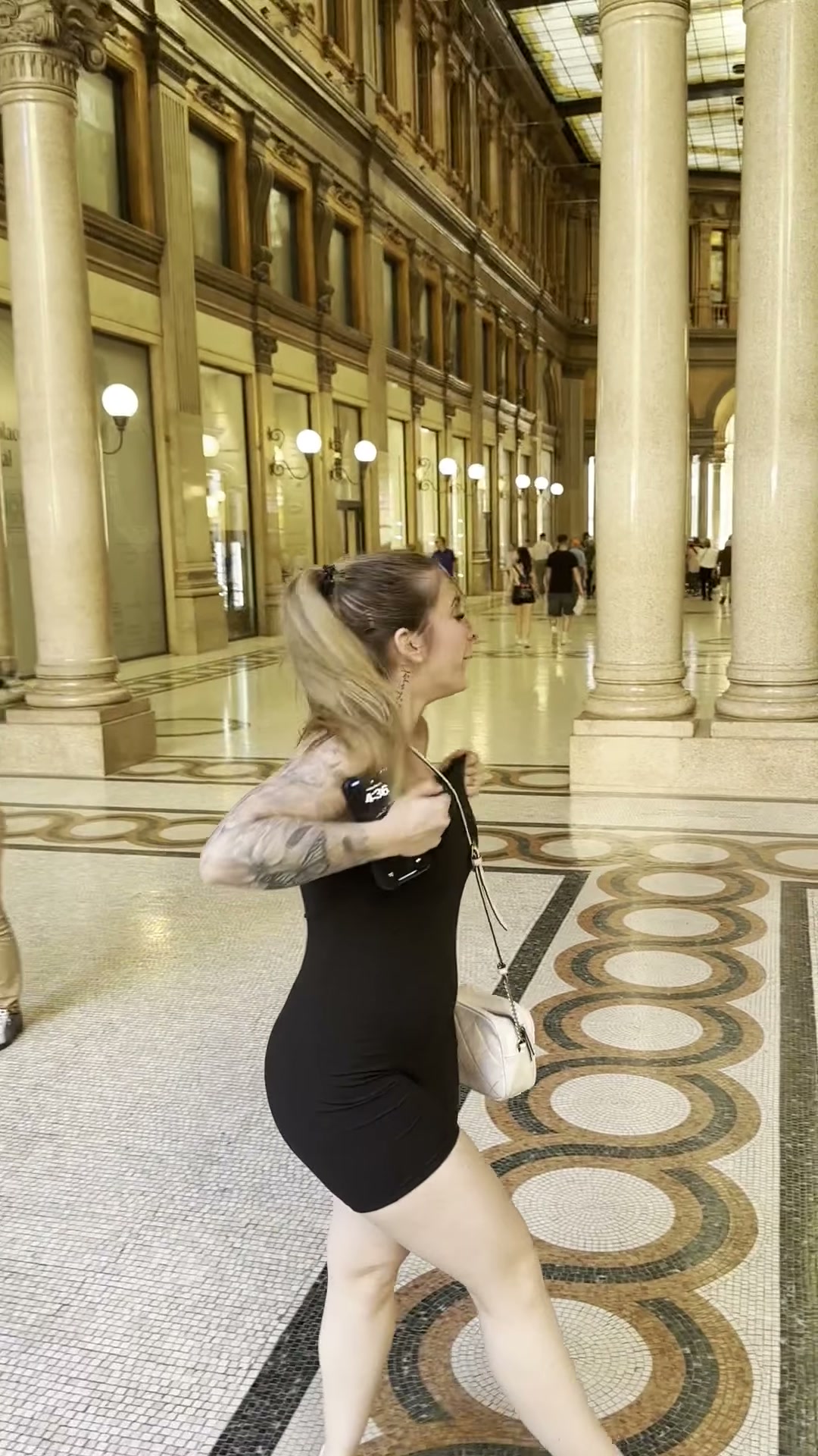Showing off my big titties in Italy :)