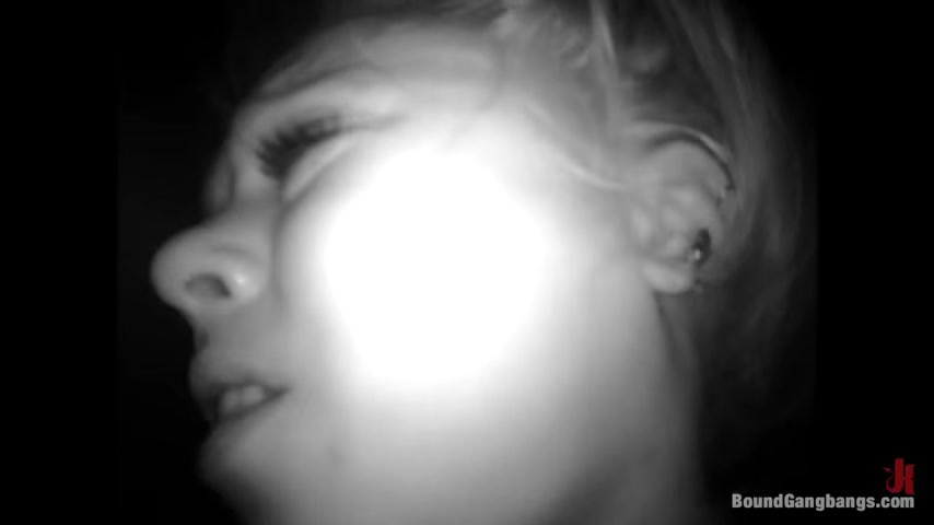 They let her head out just long enough to cum on her, and she thanks them for her treatment.