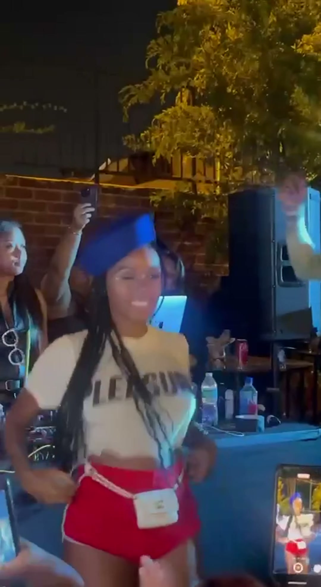Janelle Monae flashing at concert